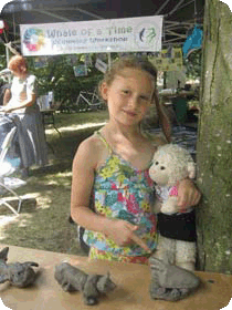 girl with her clay model