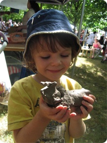 boy with his clay model