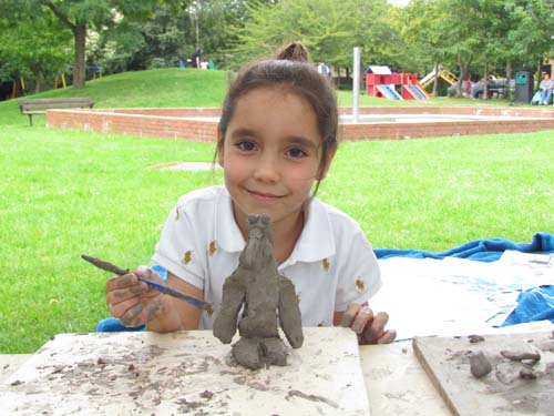 boy with his clay model