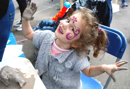 girl making clay models