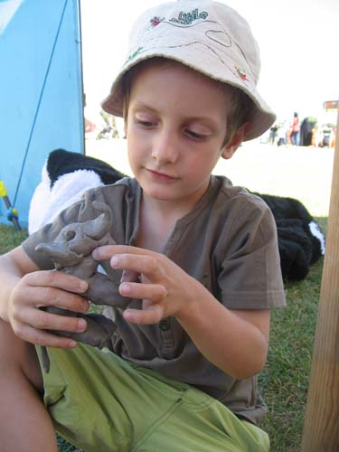 boy with clay model