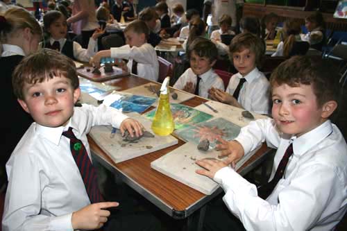 pupils making clay models
