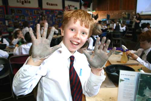 pupils making clay models