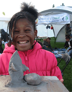 girl with her clay model