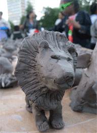 girl with her clay model