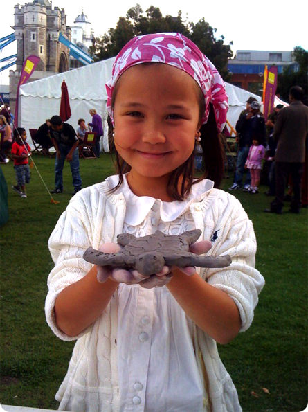 girl with her clay model