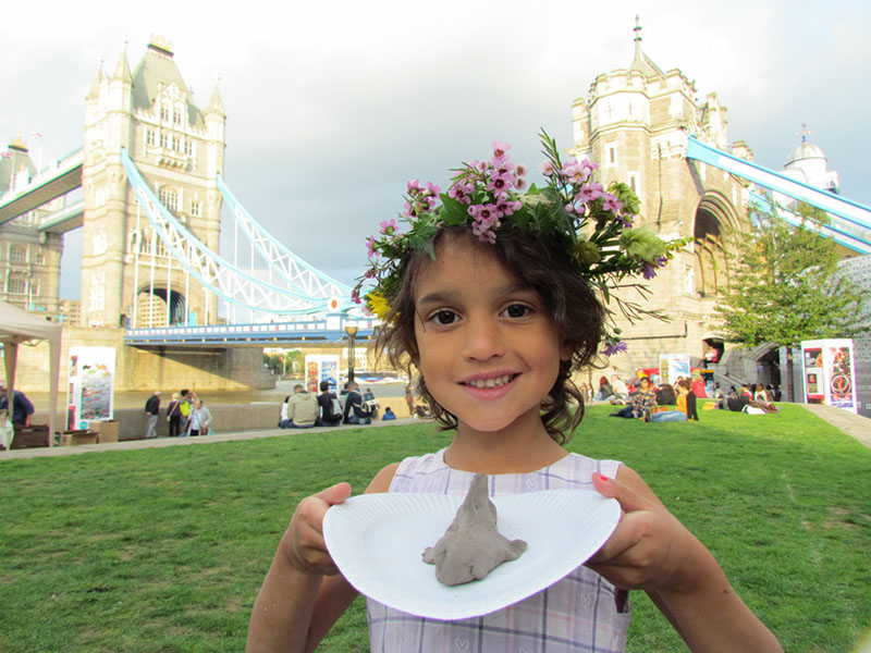 girl with her clay model