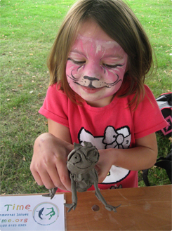 girl with her clay model