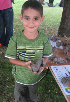 boy with his clay model