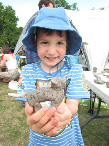 boy with his clay model